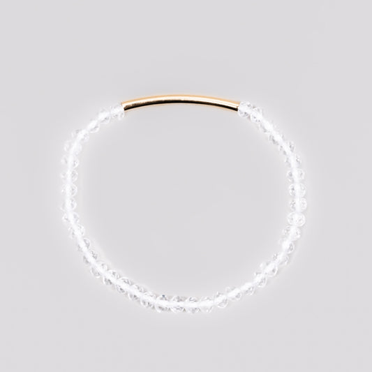 Brățară elastică cu accent auriu și pietre mici translucide - Transparent