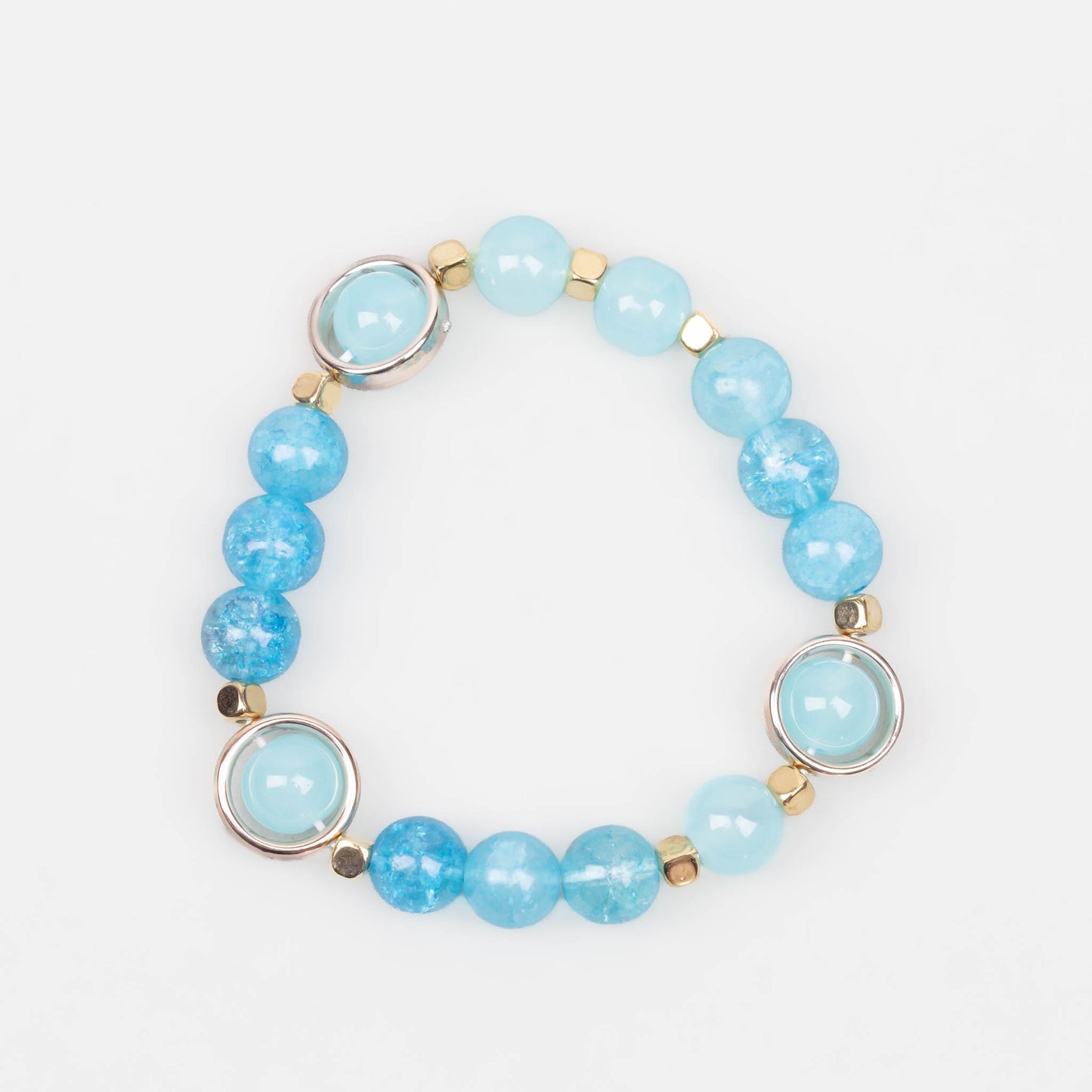 Brățară elastică cu mărgele marmorate și elemente aurii - Albastru