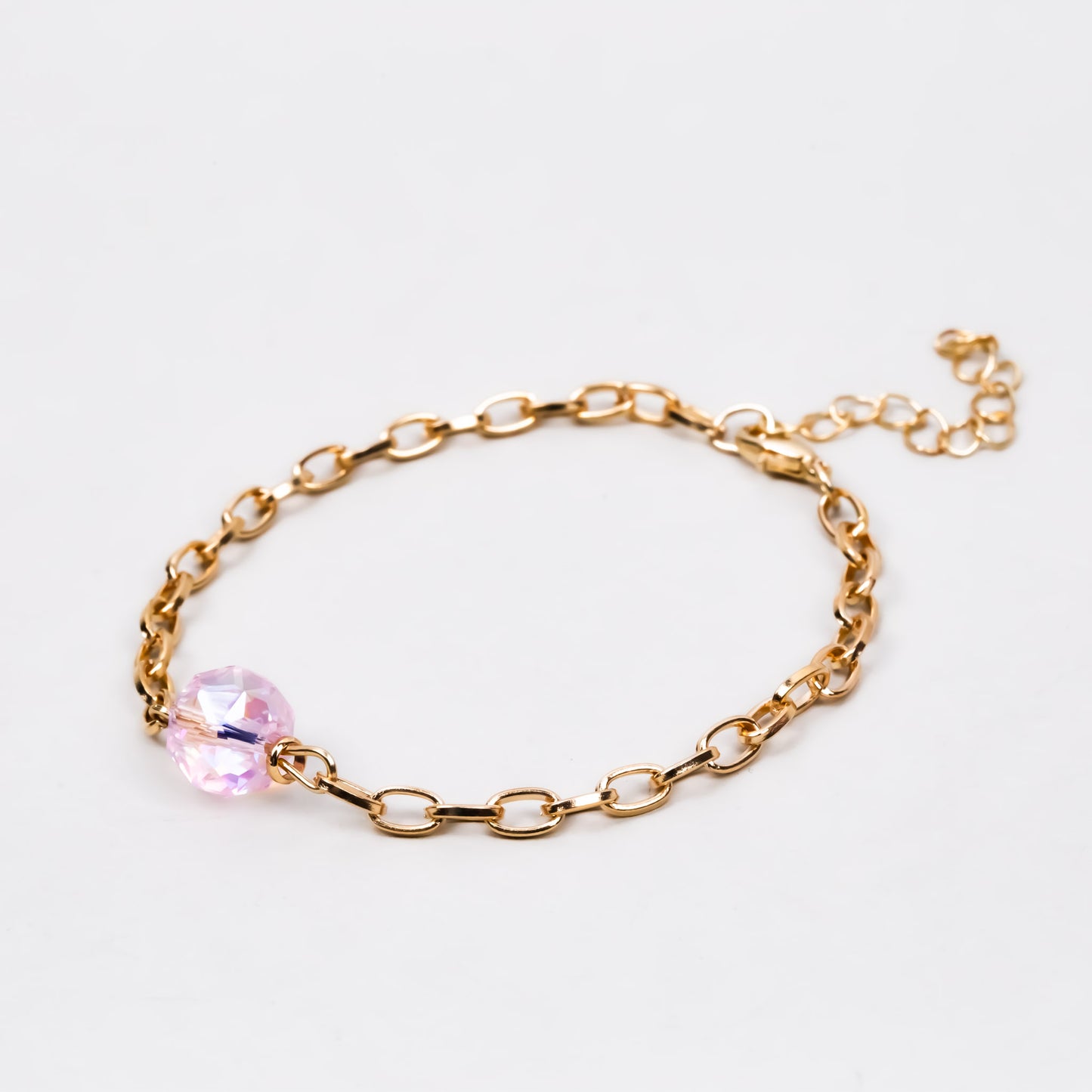 Brățară reglabilă cu lănțișor și piatră roz