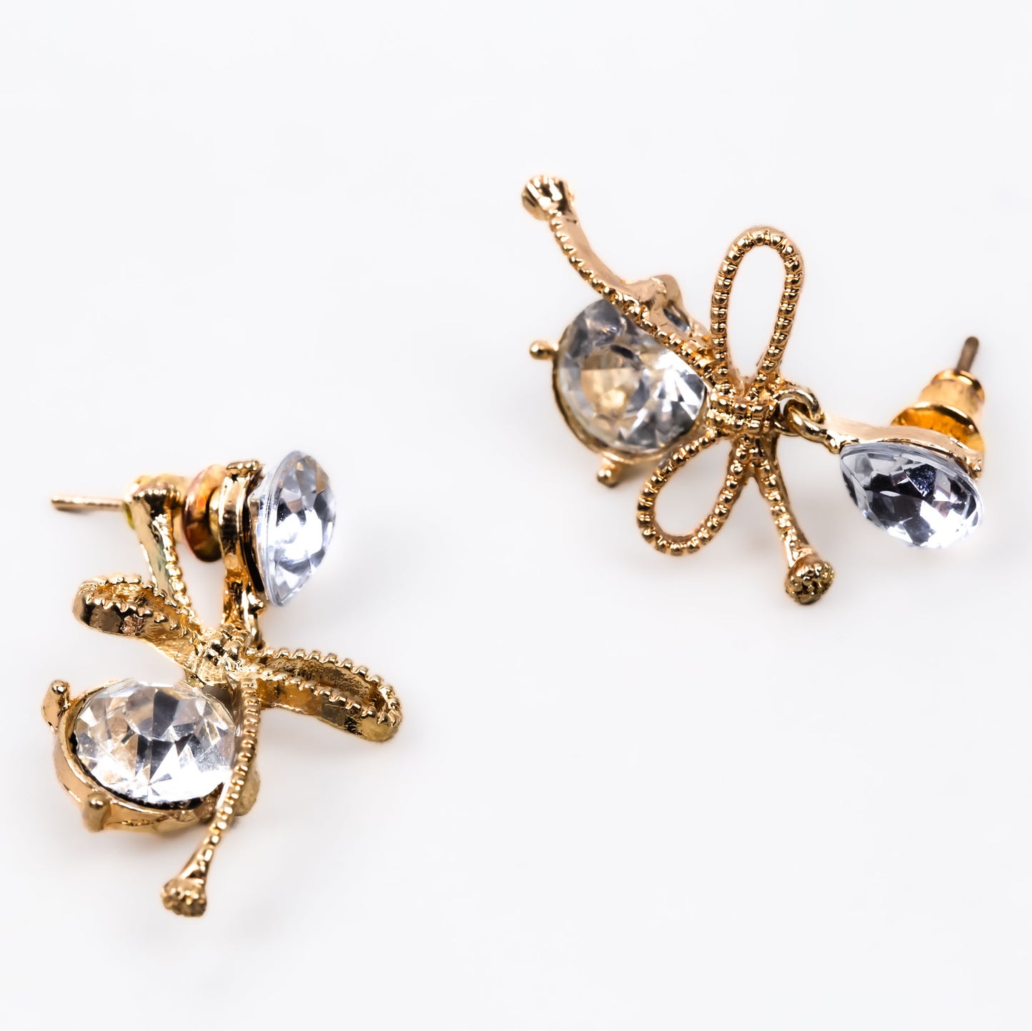 Cercei cu fundiță și pietre strălucitoare - Auriu