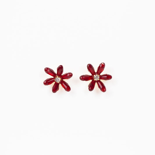 Cercei în formă de floare cu pietre roșii