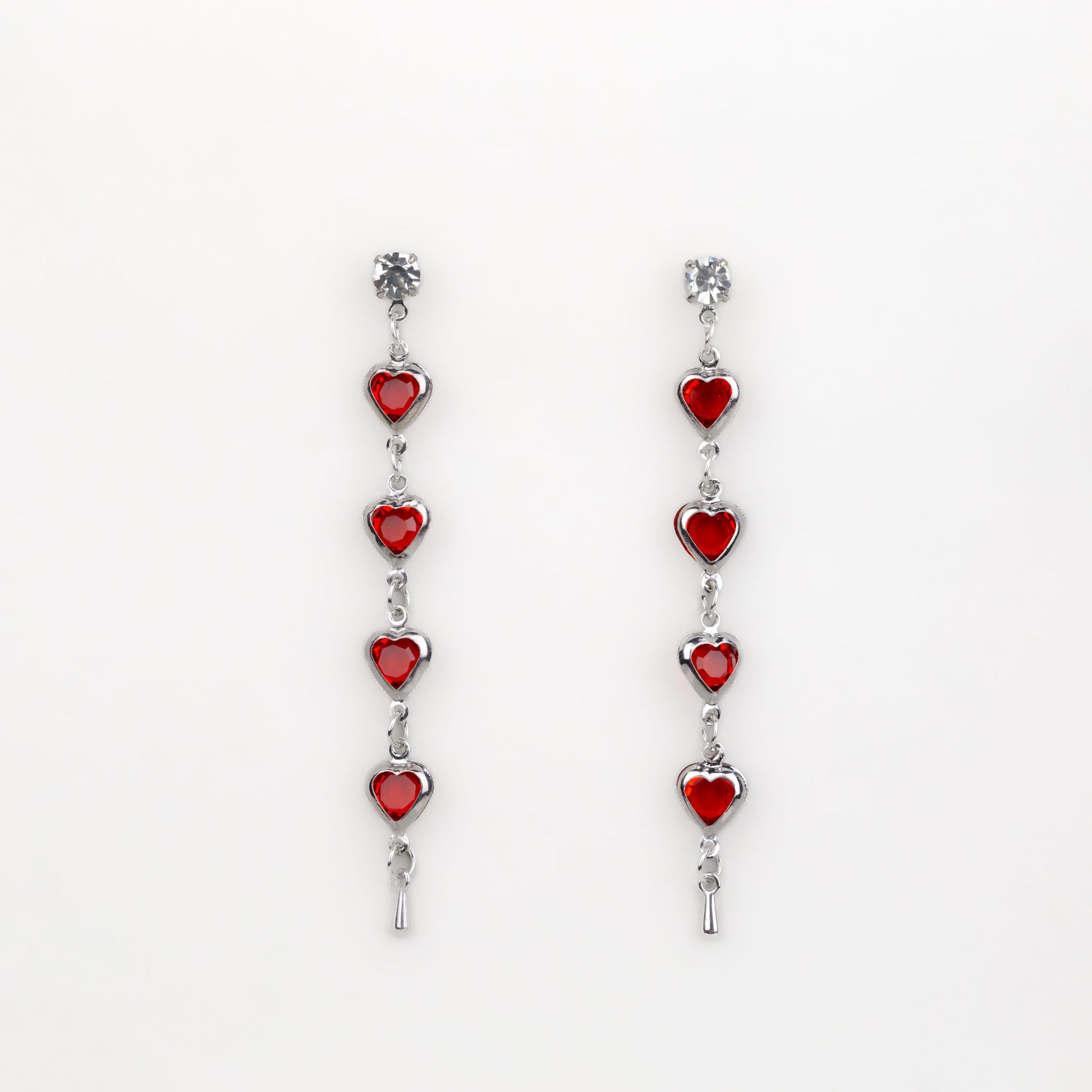 Cercei lungi cu zale în formă de inimă și pietre roșii - Argintiu