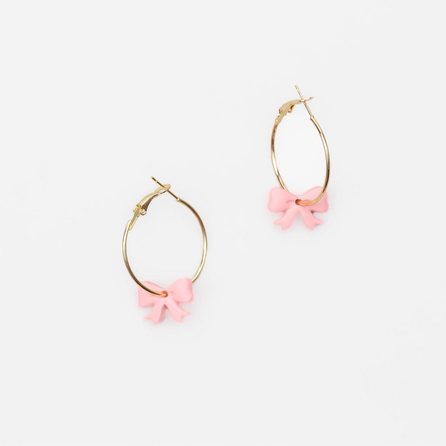 Cercei rotunzi aurii cu fundiță siliconată - Roz
