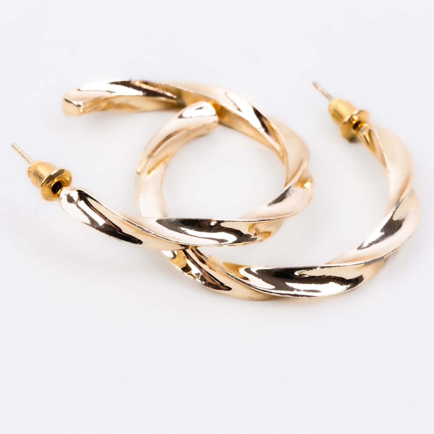 Cercei rotunzi spiralați cu textură delicată - Auriu cosmic