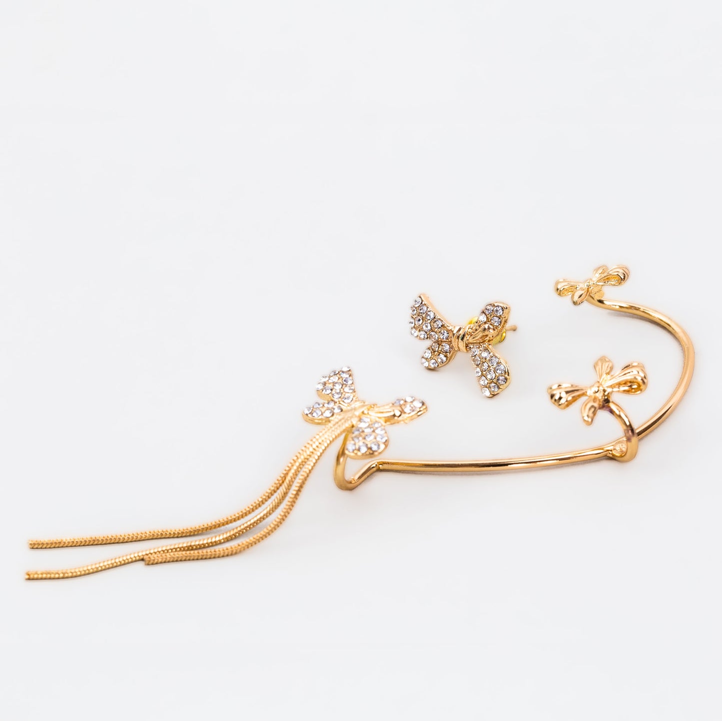 Cercel ear cuff cu lanțuri fine și fundițe, set 2 buc - Auriu magic
