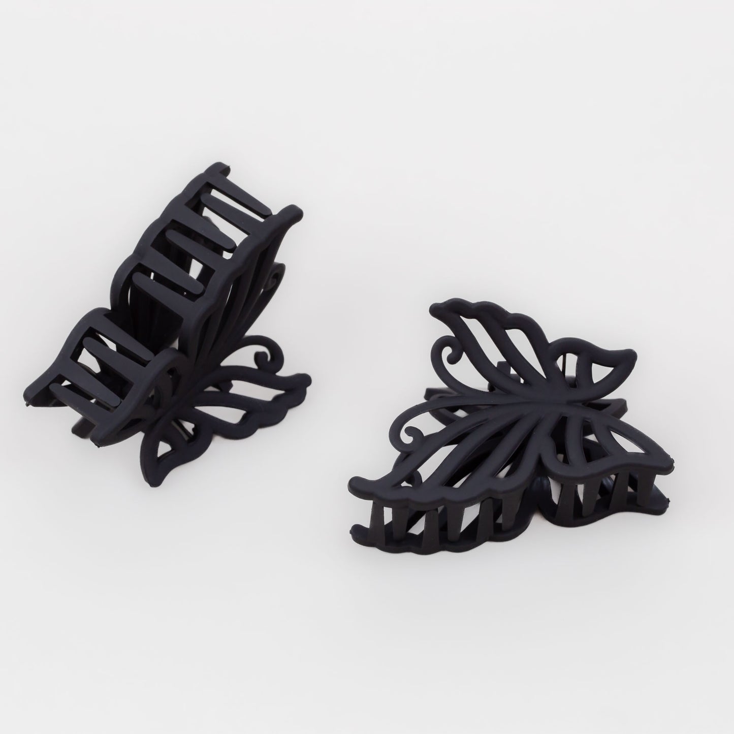 Clame de păr medii în formă de fluture cu textură de silicon, set 2 buc - Negru