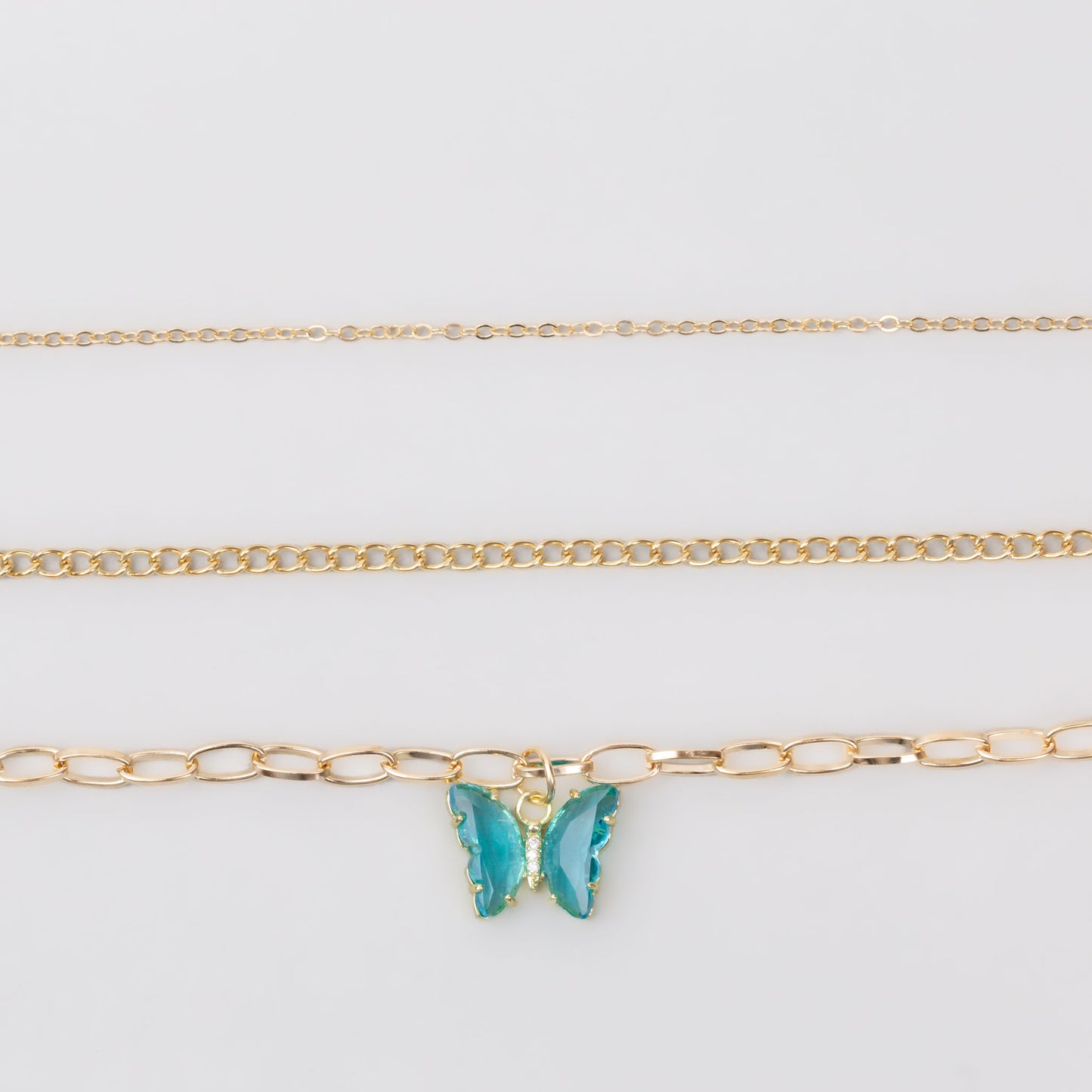 Coliere cu lanț auriu și pandantiv în formă de fluture cu pietre, set 3 buc - Albastru
