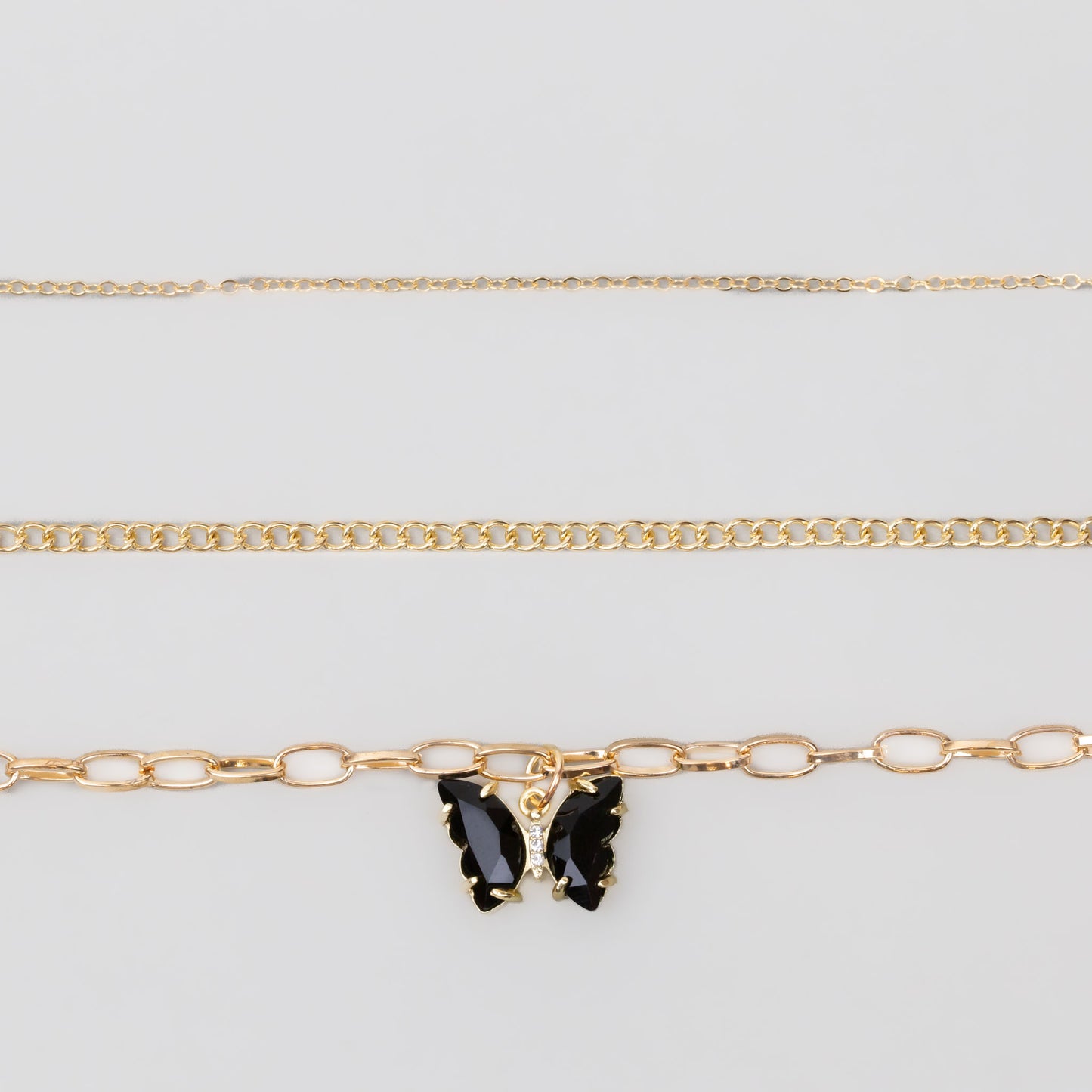 Coliere cu lanț auriu și pandantiv în formă de fluture cu pietre, set 3 buc - Negru