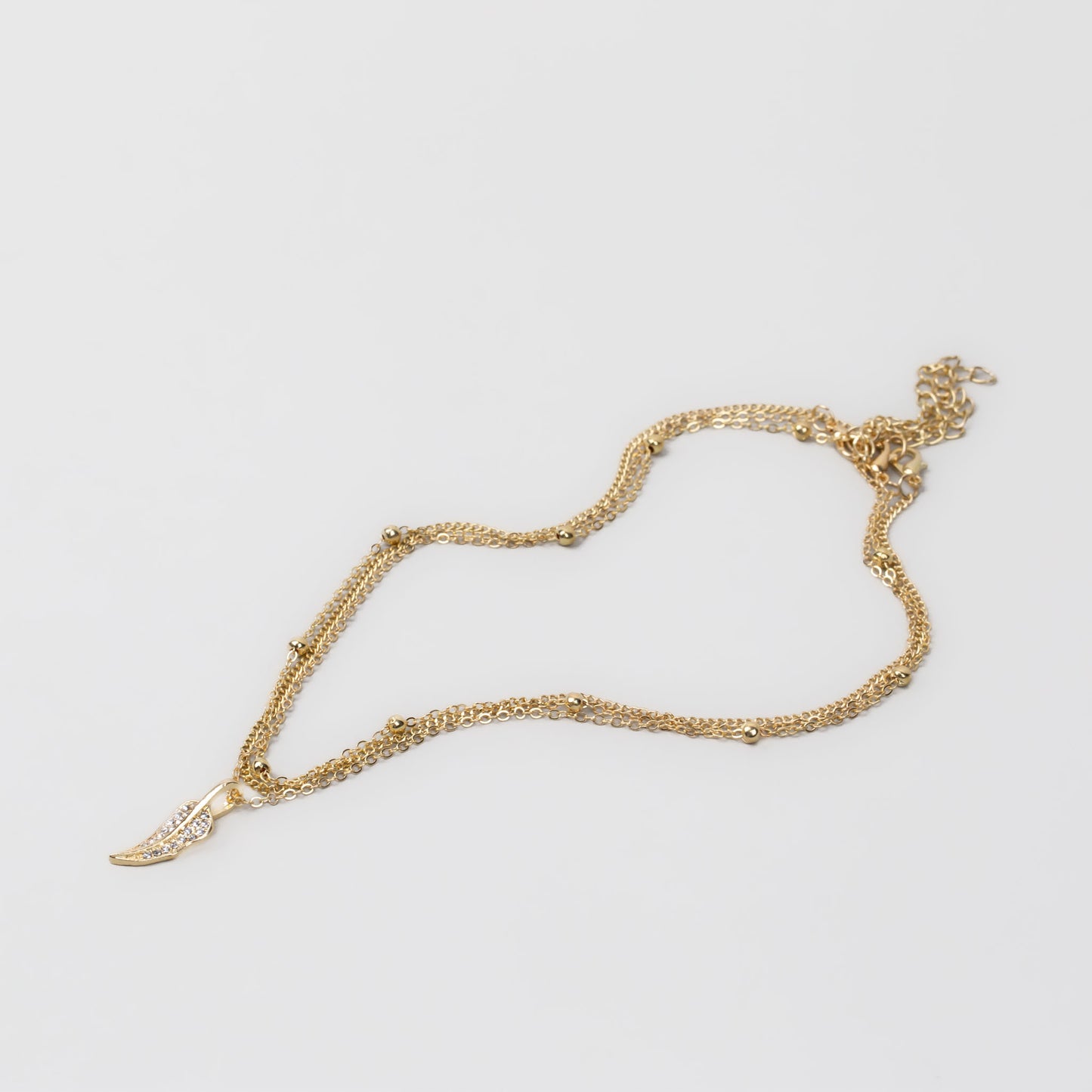Coliere cu lanț și pandantiv în formă de frunză cu ștrasuri, set 3 buc - Auriu