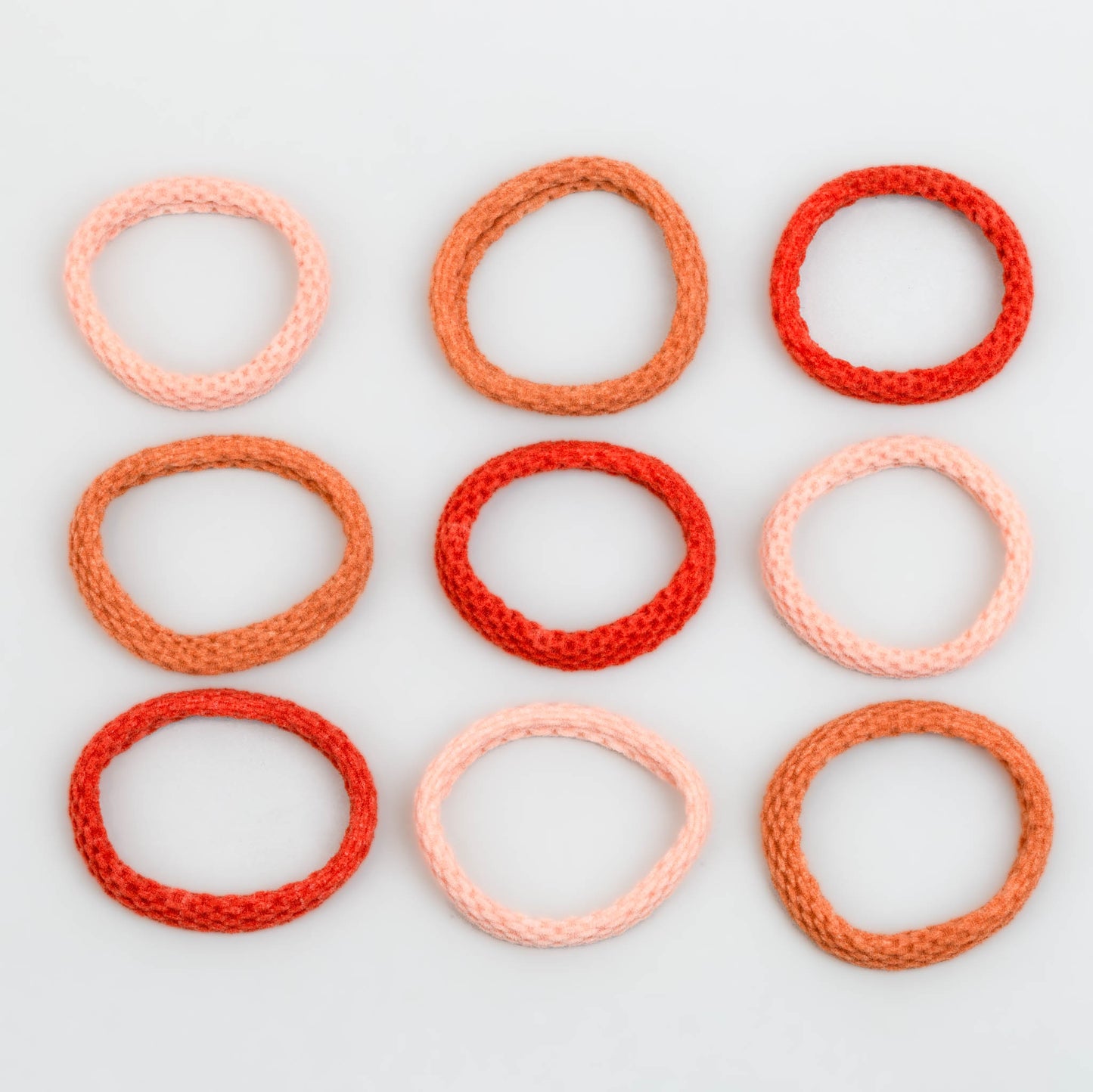 Elastice de păr simple cu textură împletită, grosime 0,7 cm, set 9 buc - Portocaliu Mix