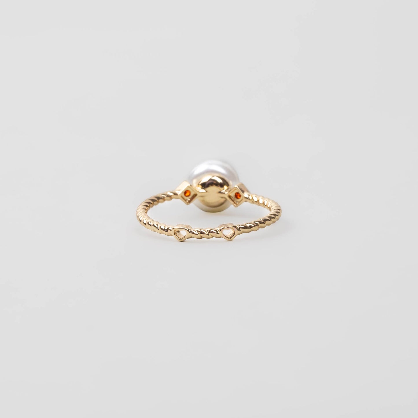 Inel spiralat delicat cu perlă și pietre portocalii - Auriu