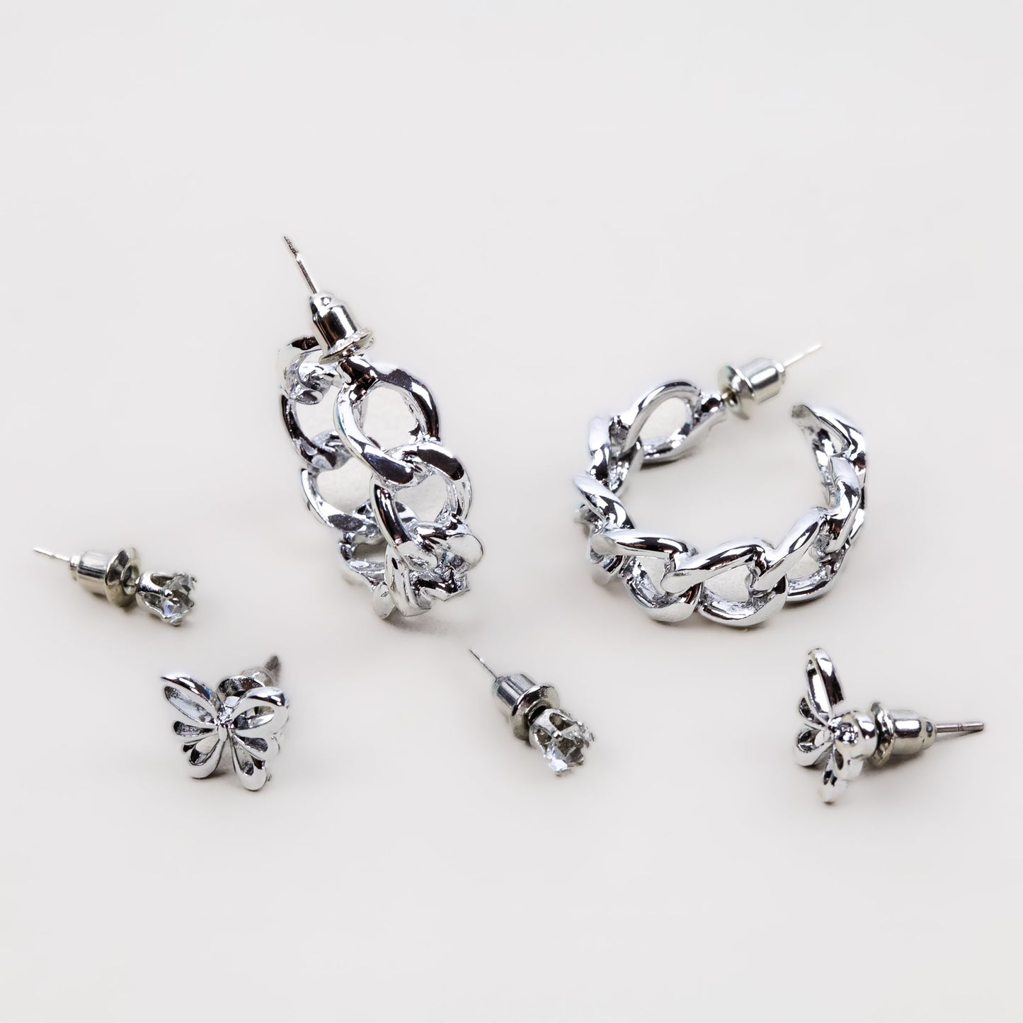 Set cercei cu verigă și fluture, 3 perechi - Argintiu