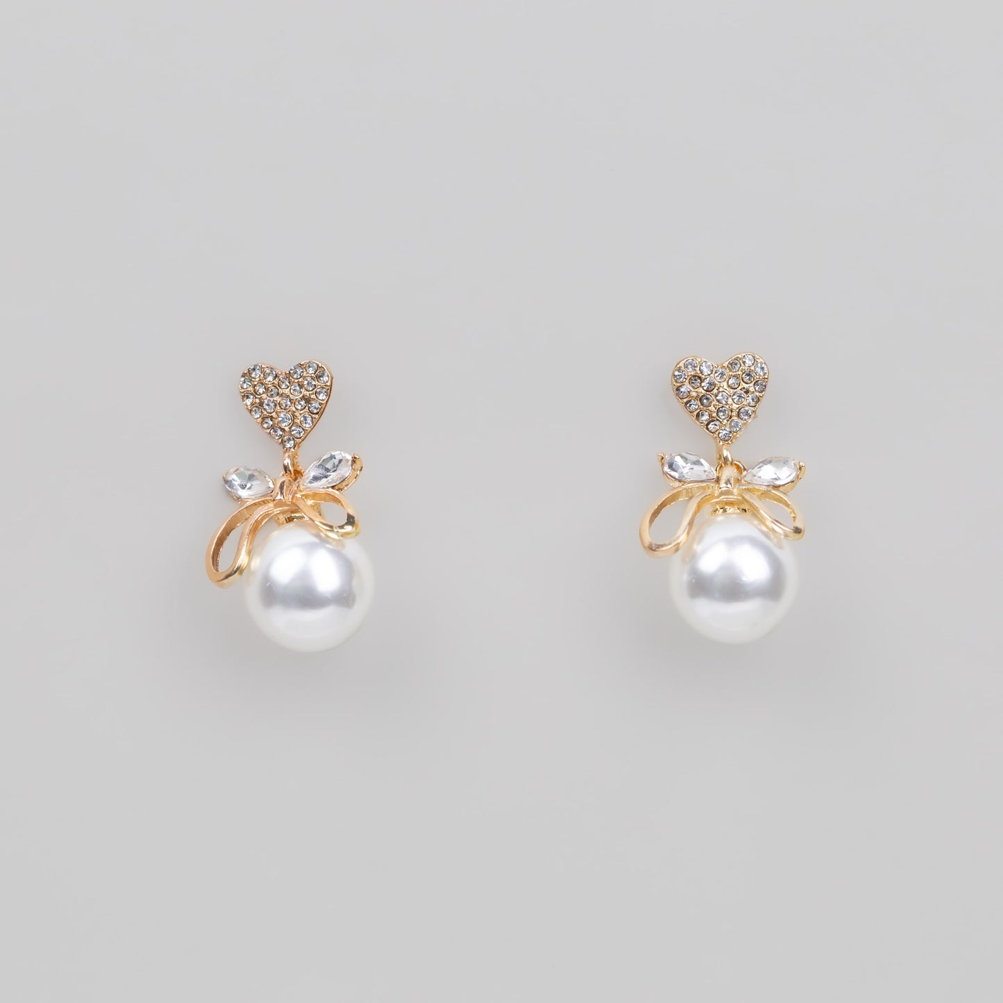 Cercei lovely princess cu inimă, fundiță și pietre - Auriu