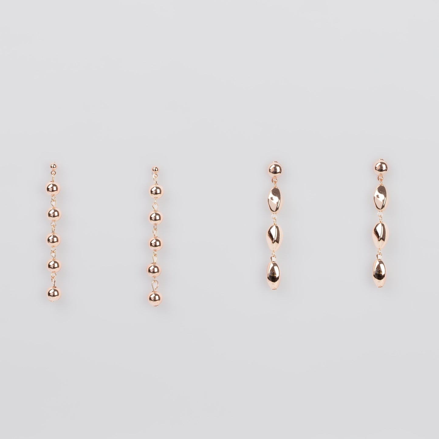 Cercei lungi cu biluțe și secțiuni geometrice, set 2 - Rose Gold