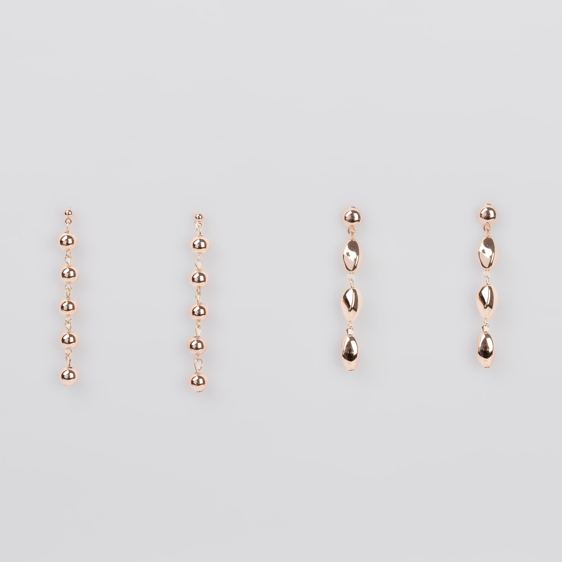 Cercei lungi cu biluțe și secțiuni geometrice, set 2 - Rose Gold