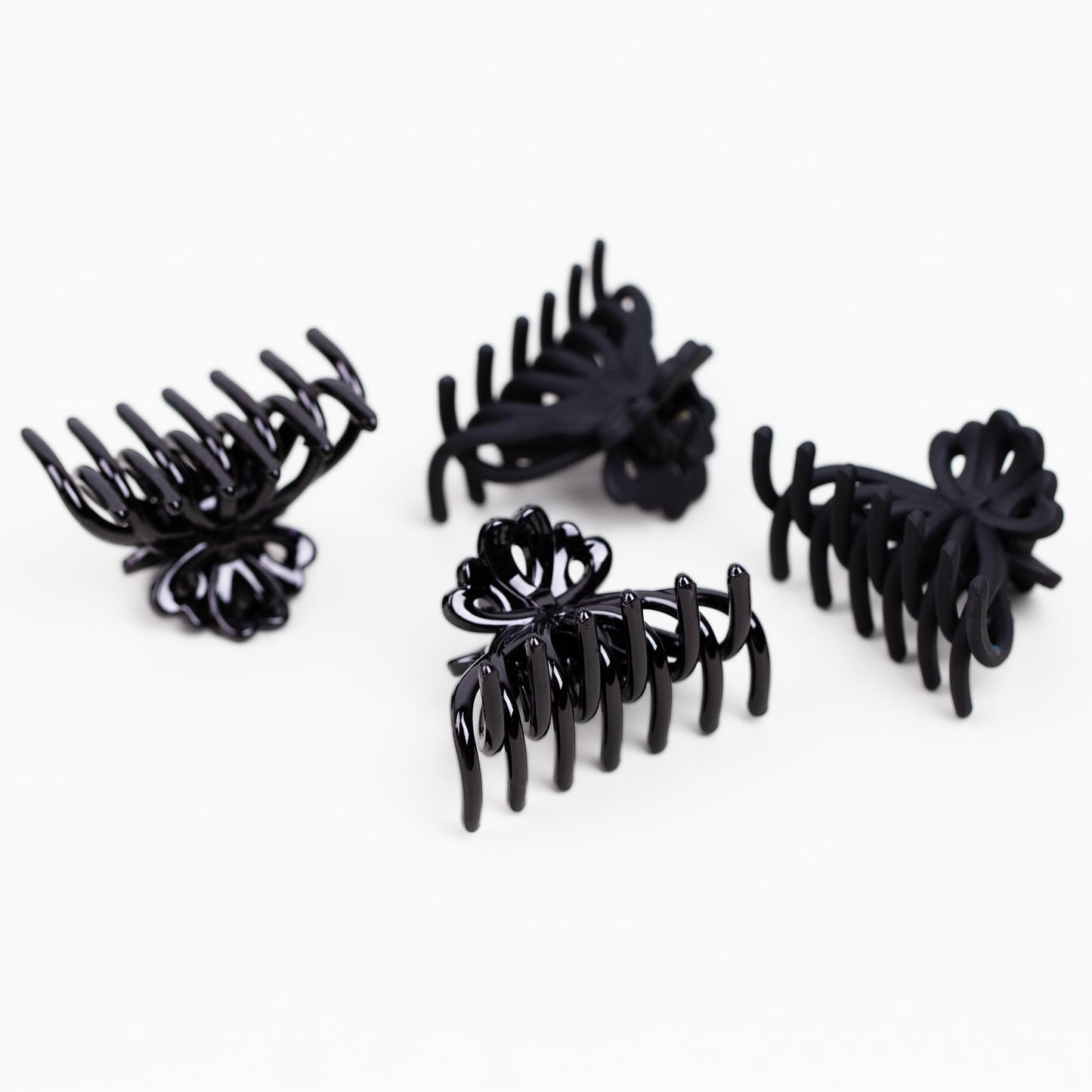 Clame de păr medii tip octopus cu texturi mixte, set 4 buc - Negru
