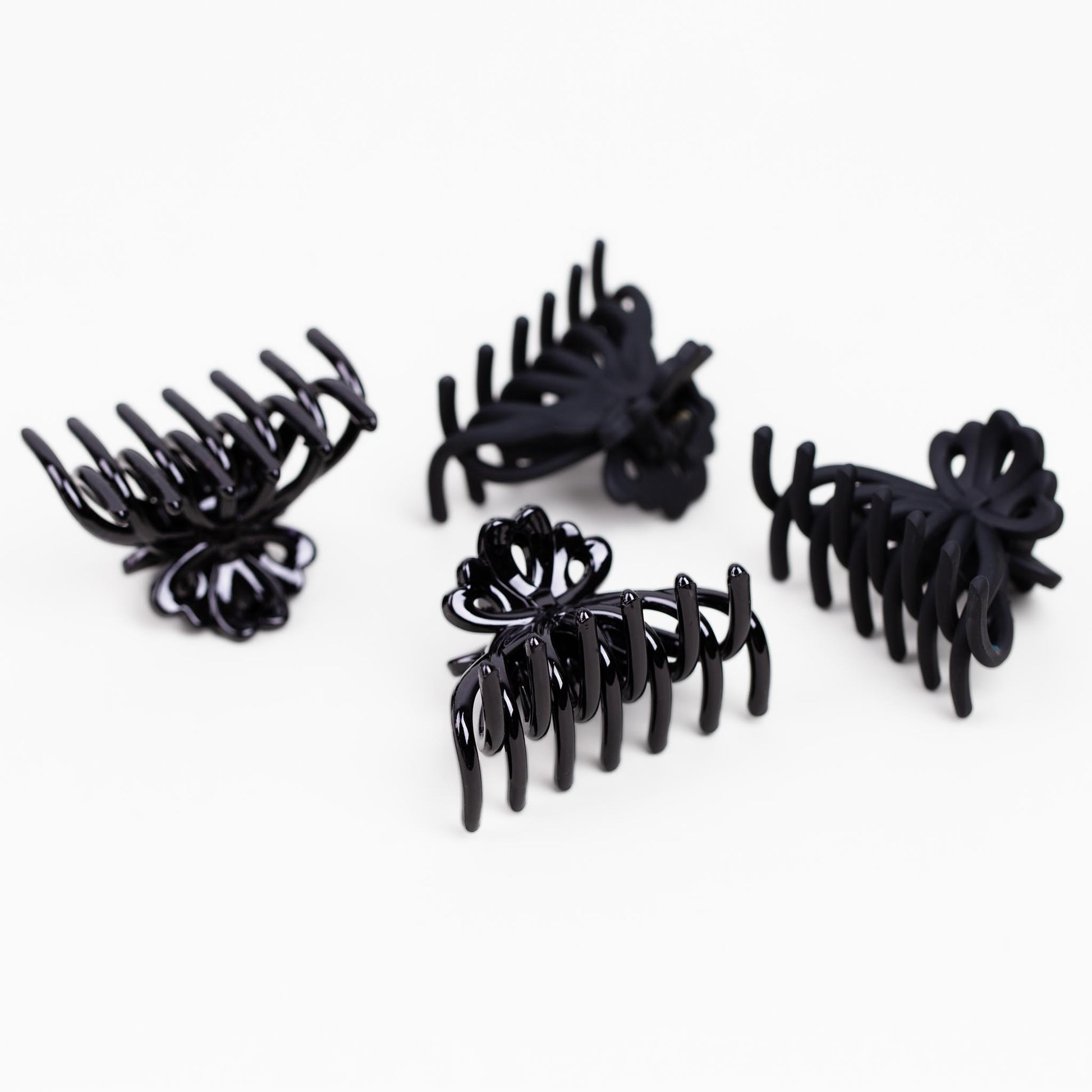 Clame de păr medii tip octopus cu texturi mixte, set 4 buc - Negru