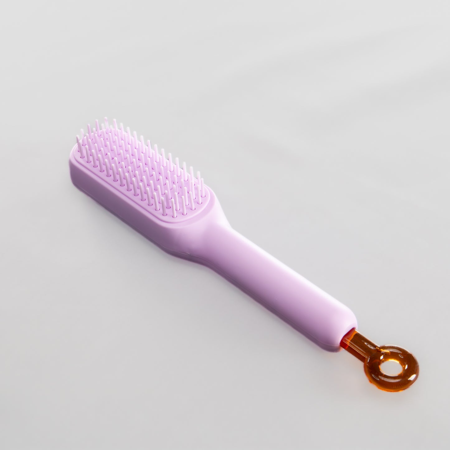 Perie de păr auto-curățabilă - Mov