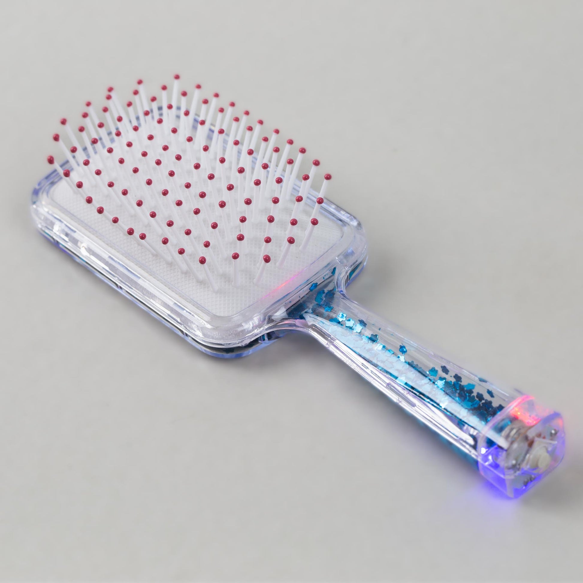 Perie păr copii cu leduri pătrată, transparent cu confetti - Albastru Butterfly